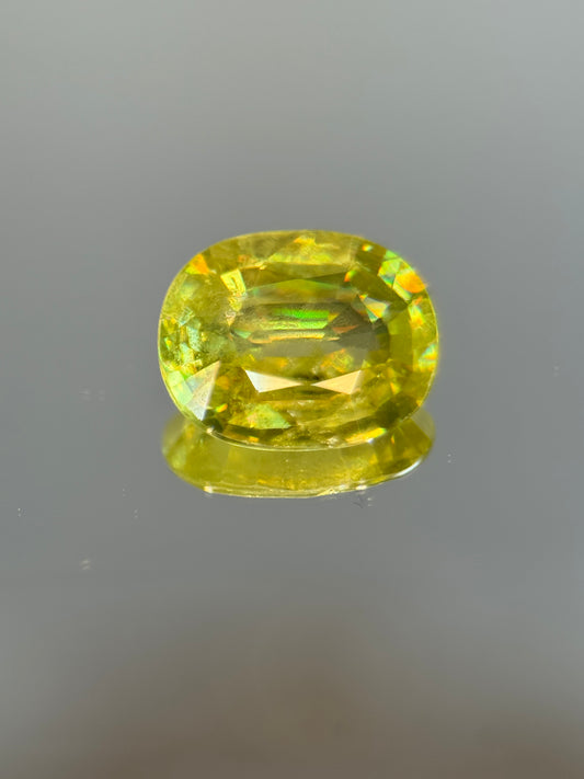 1.74 Ct Natural Greenish-Yellow Sphene – VS Rare High Dispersion Collector’s Gem